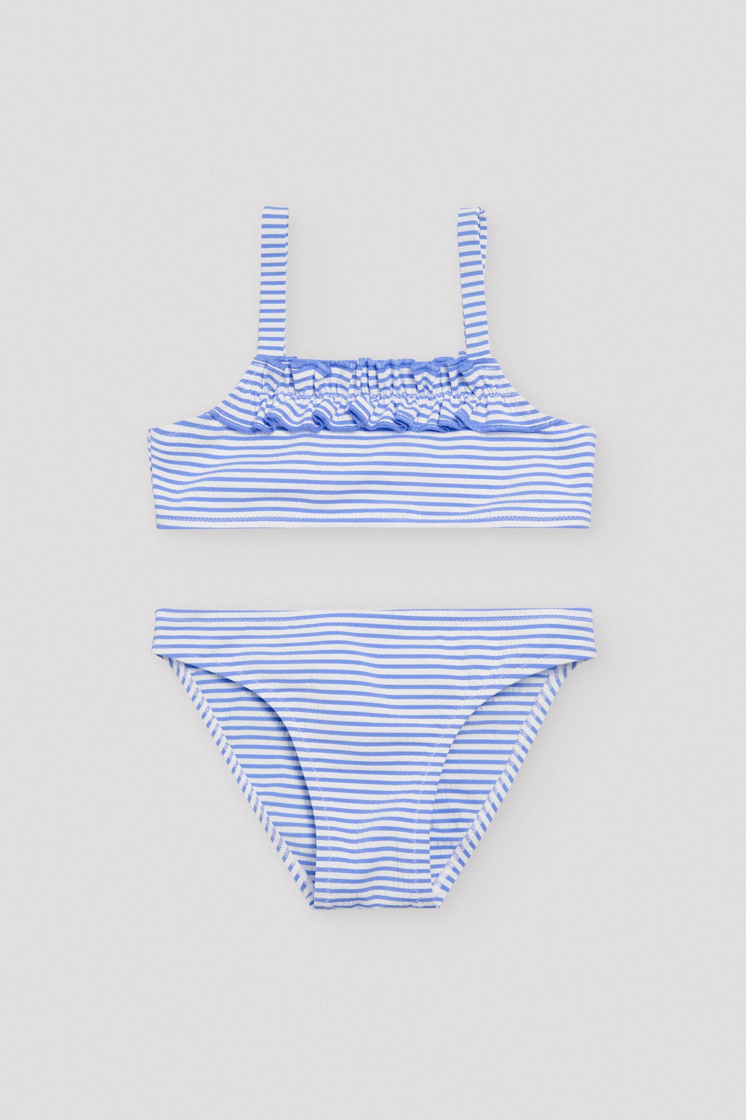 Conjunto de bikini niña estampado rayas azules con textura