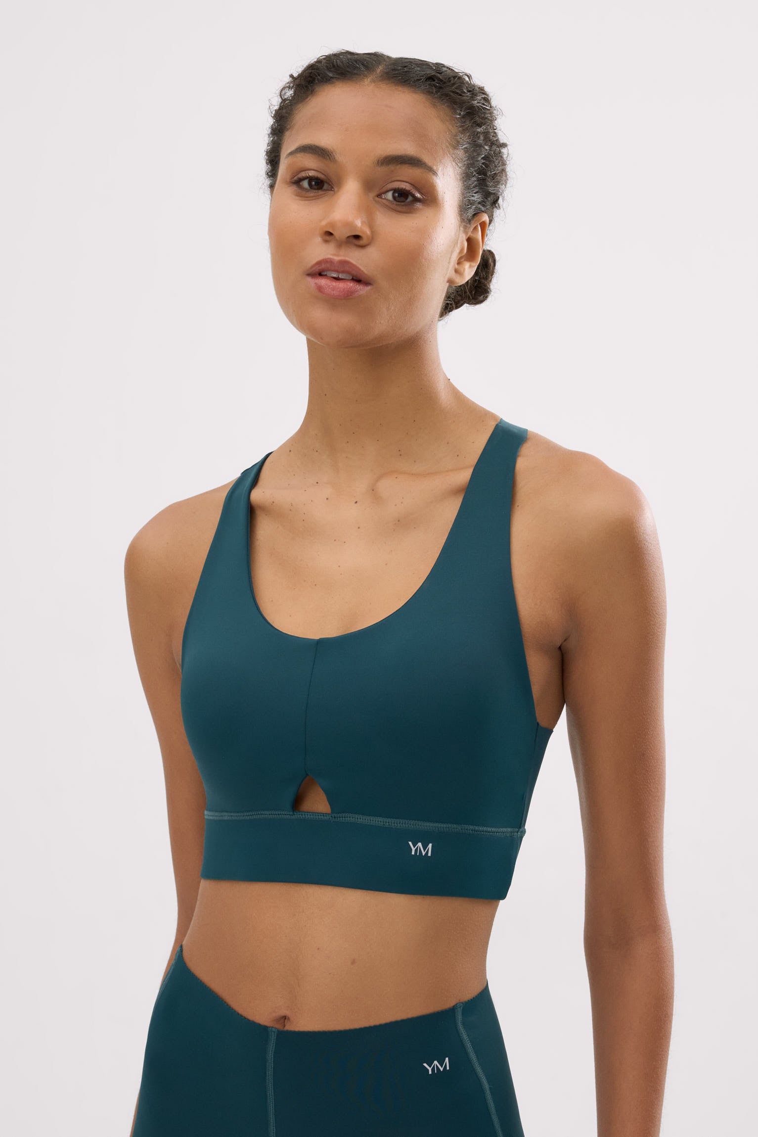 Sujetador deportivo Compressive detalle abertura verde botella