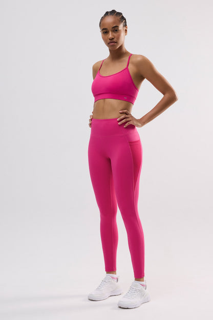 Leggings deportivos largos bolsillo lateral fucsia