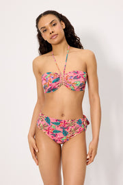 Conjunto de bikini top reductor y braga multiposición piqué estampado tropical copa C