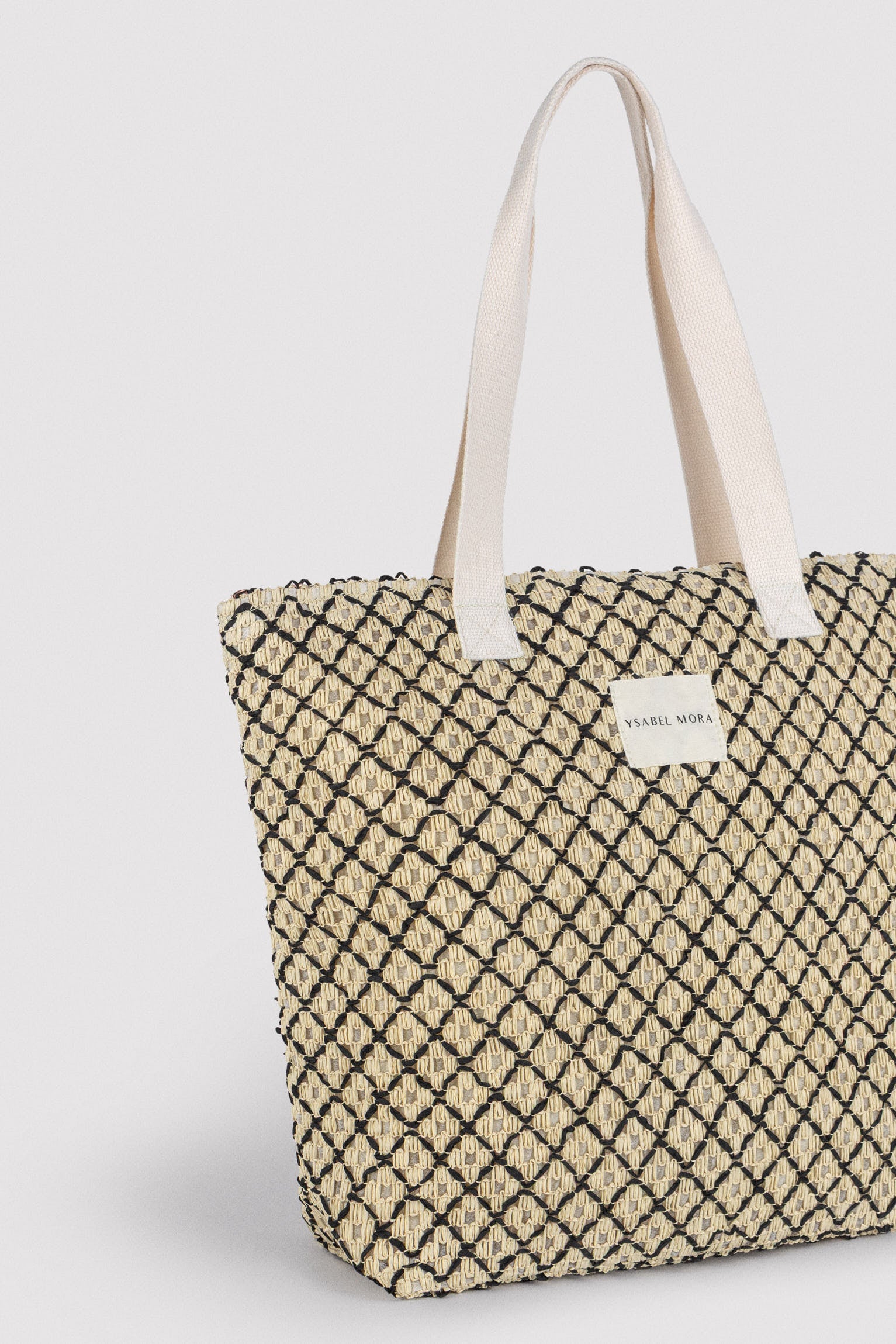 Bolso de playa de rafia beige y negro