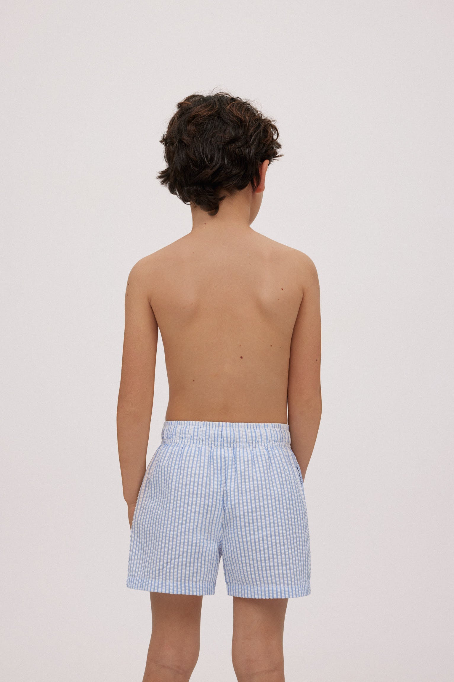 Bañador niño corto rayas azules con textura