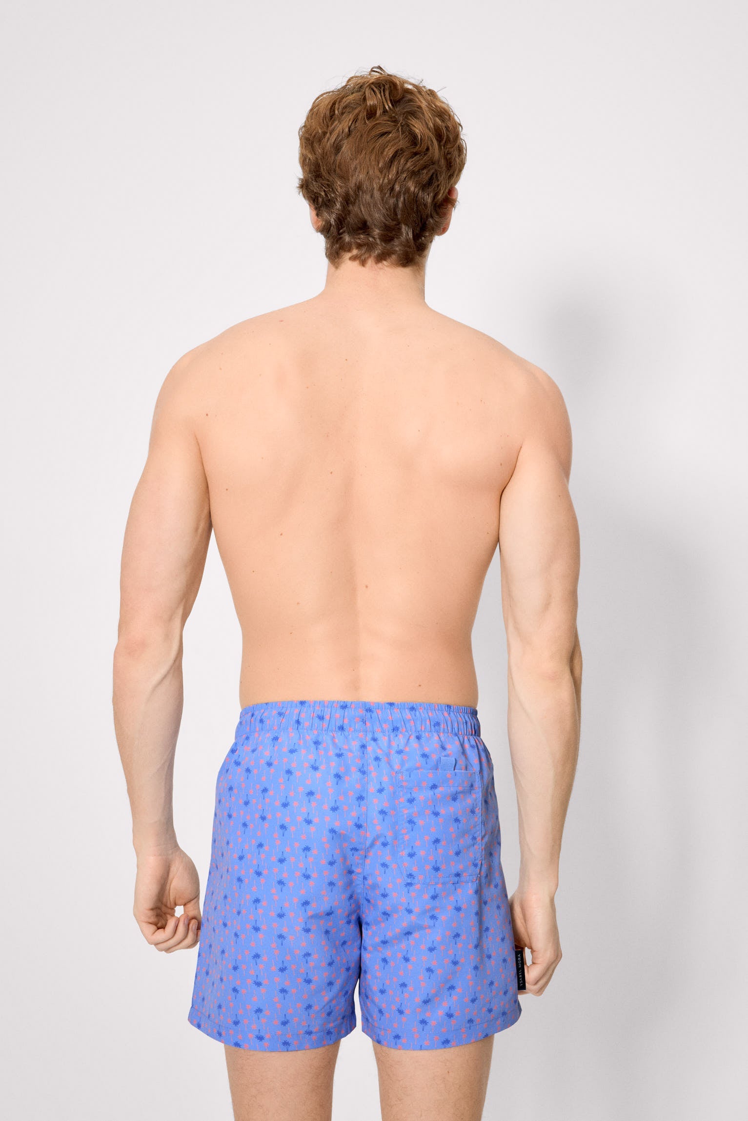Bañador medio estampado palmeras