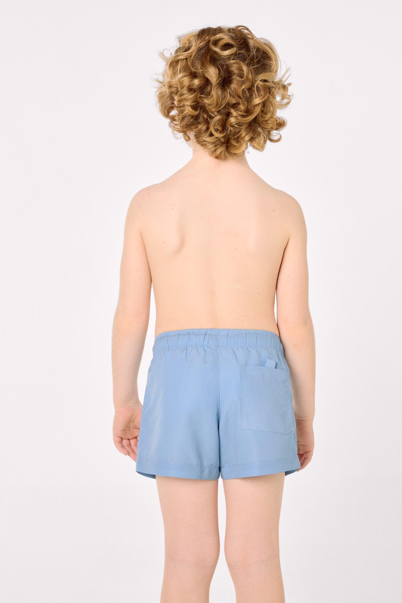 Bañador niño corto liso azul