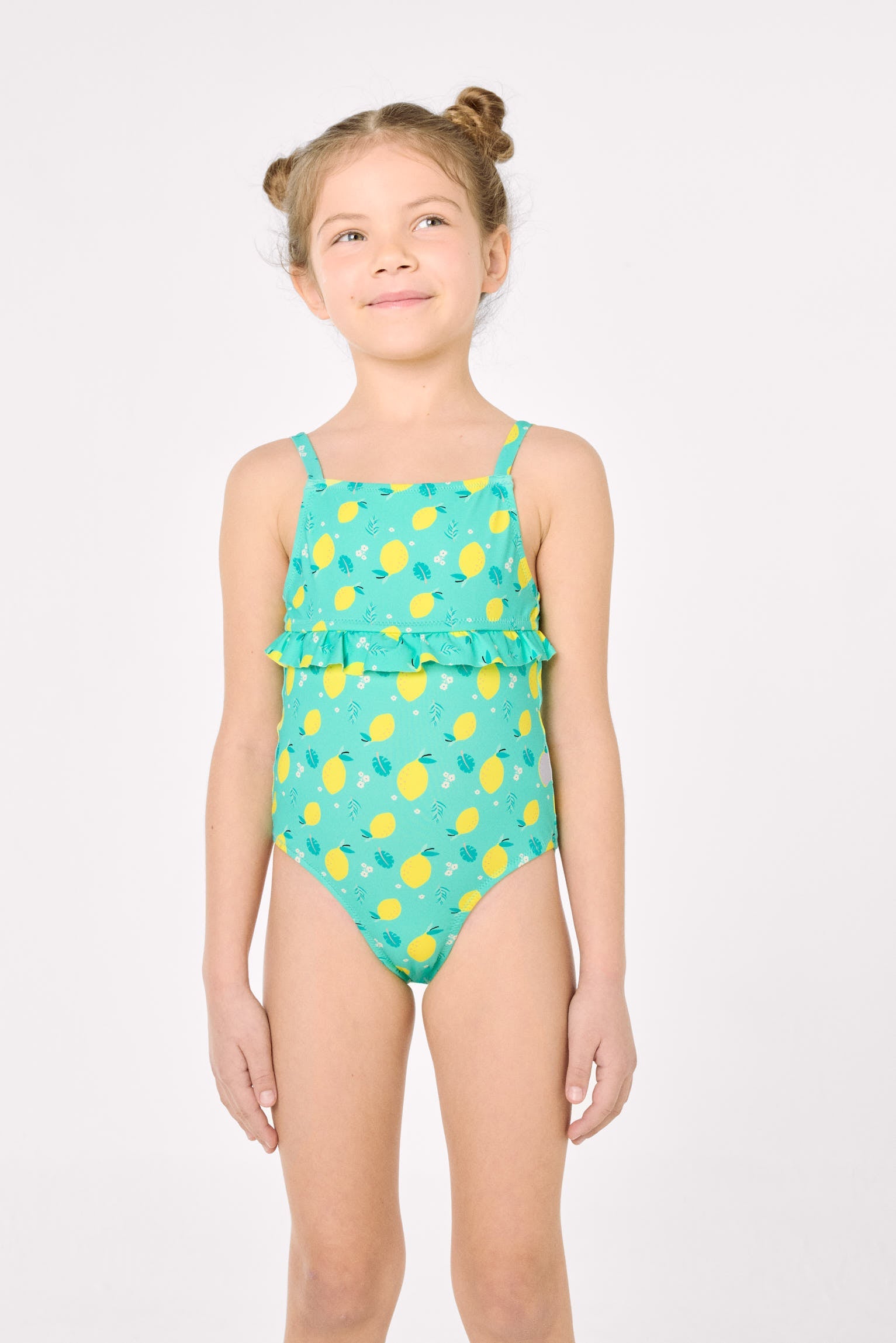 Bañador niña detalle volante estampado limones