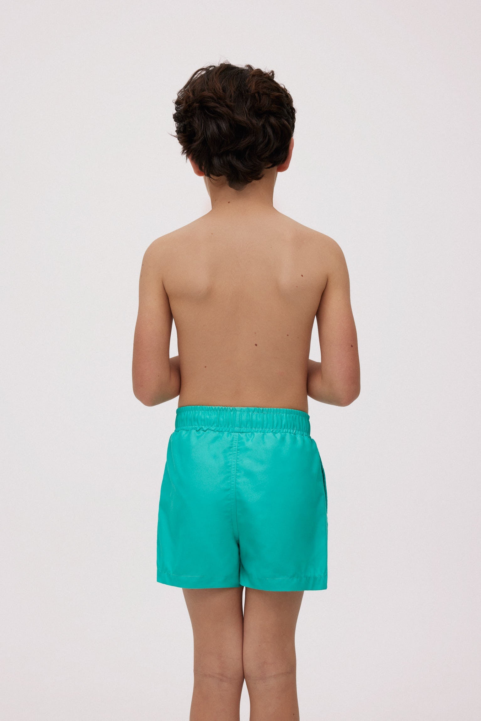 Bañador niño corto liso verde