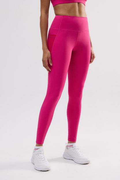 Leggings deportivos largos bolsillo lateral fucsia